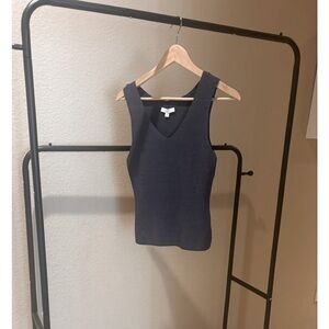 Gray top. Can be dressed up and down